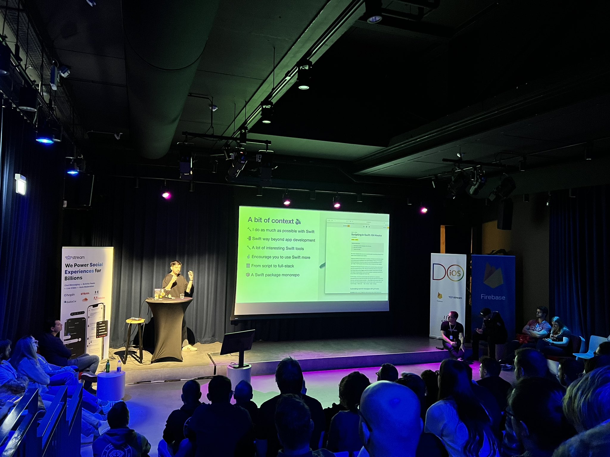 A photo of me speaking at a conference